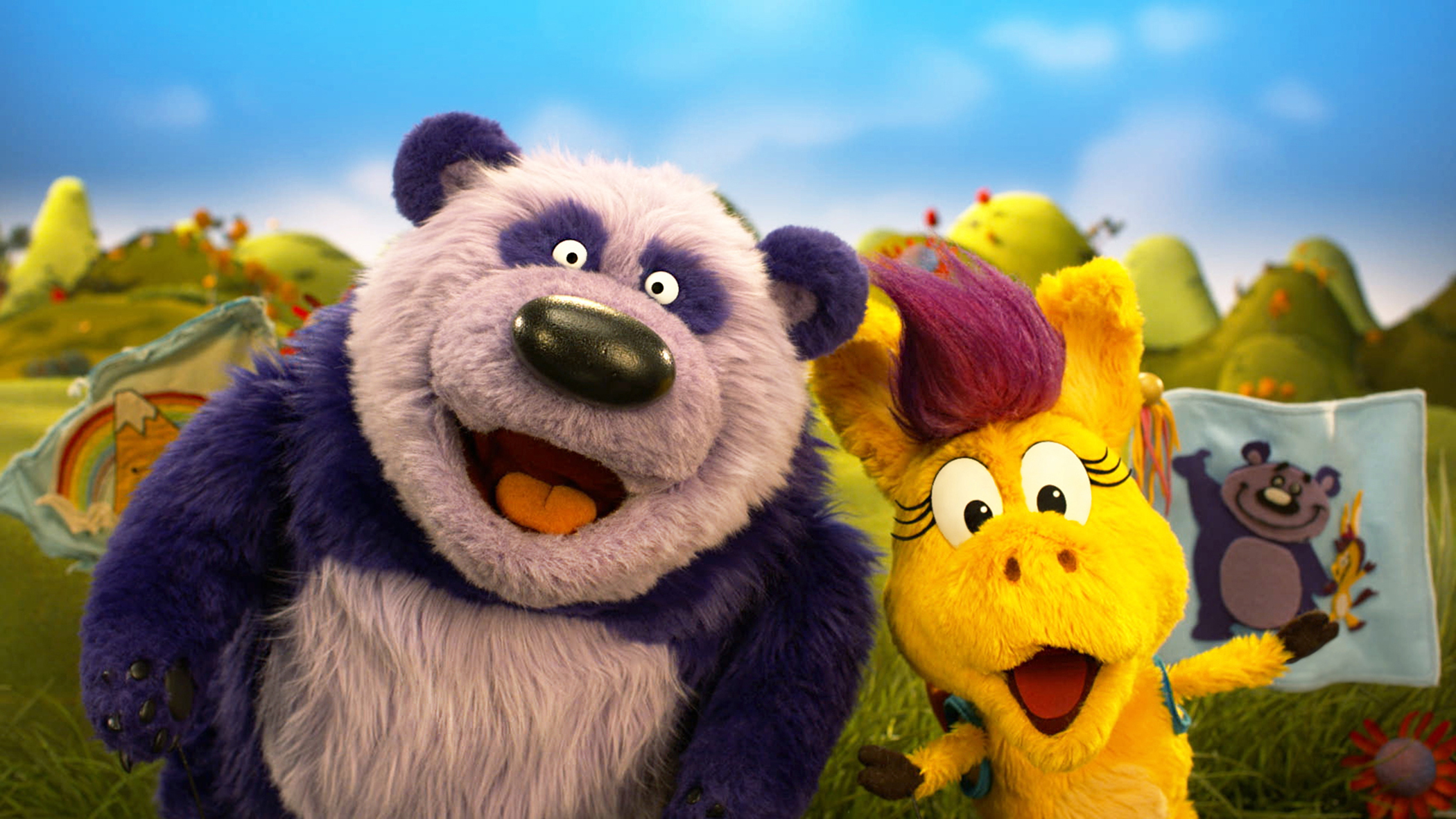 Two puppets: a panda and a yellow horse