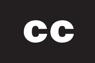 Captioning symbol: Over a black background, the letters