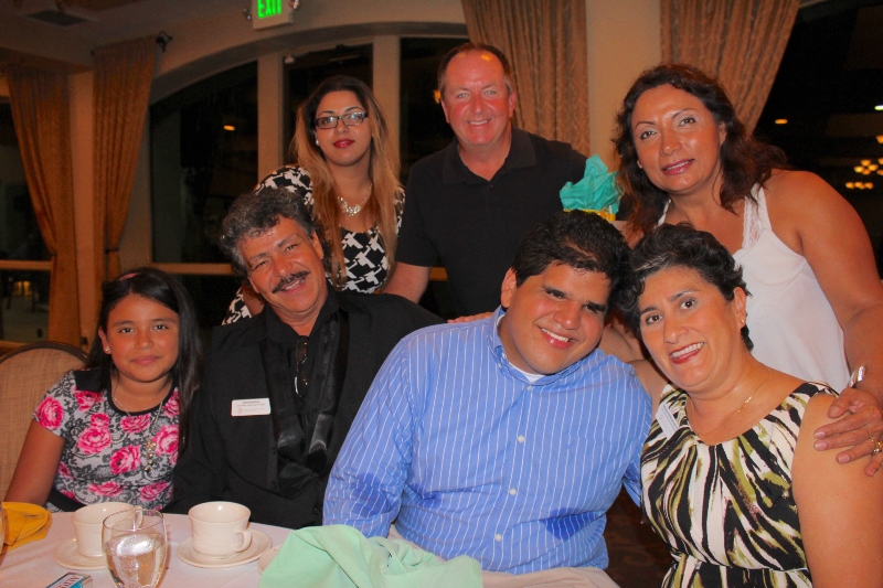 Carlos with his current family