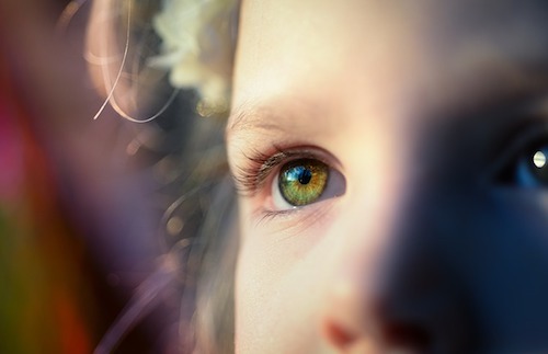 Eyes of a girl looking at the distance.