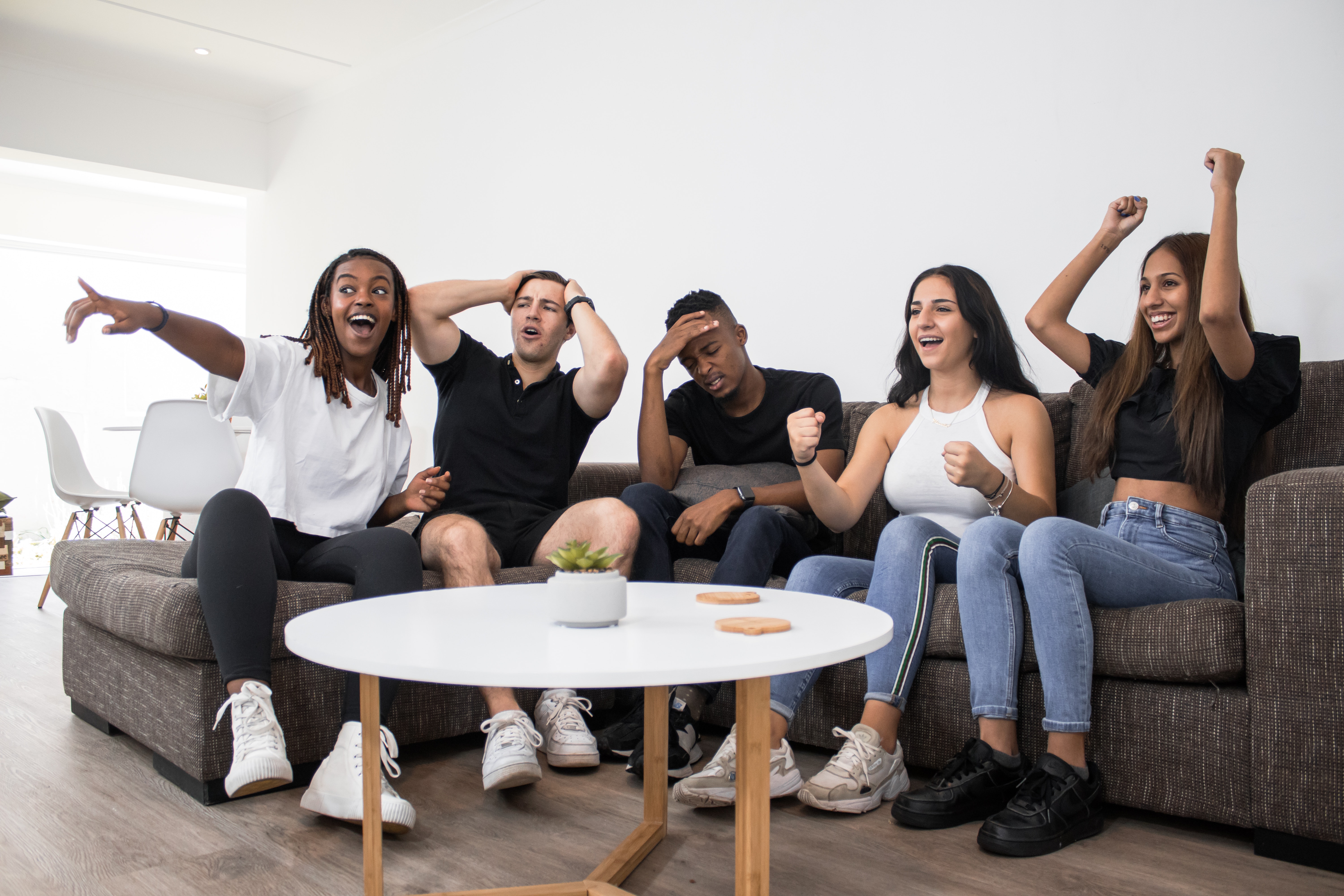 group of friends watching TV
