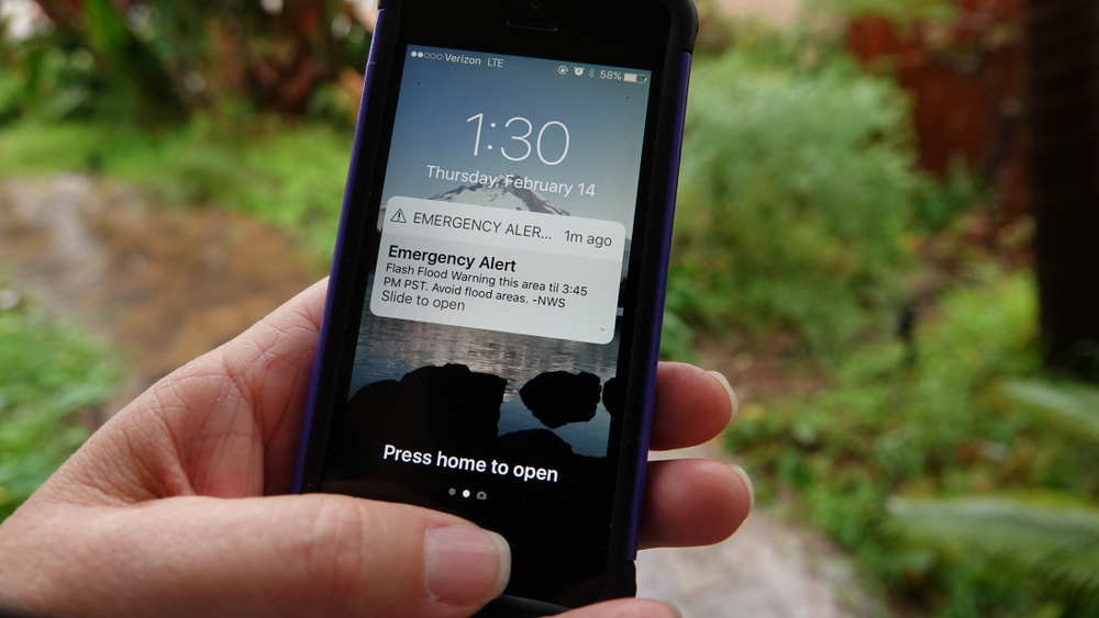 A phone showing an emergency alert